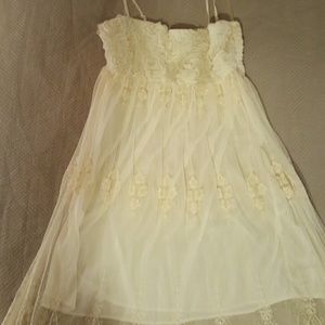 Lacey Cream Colored Dress with Rosettes